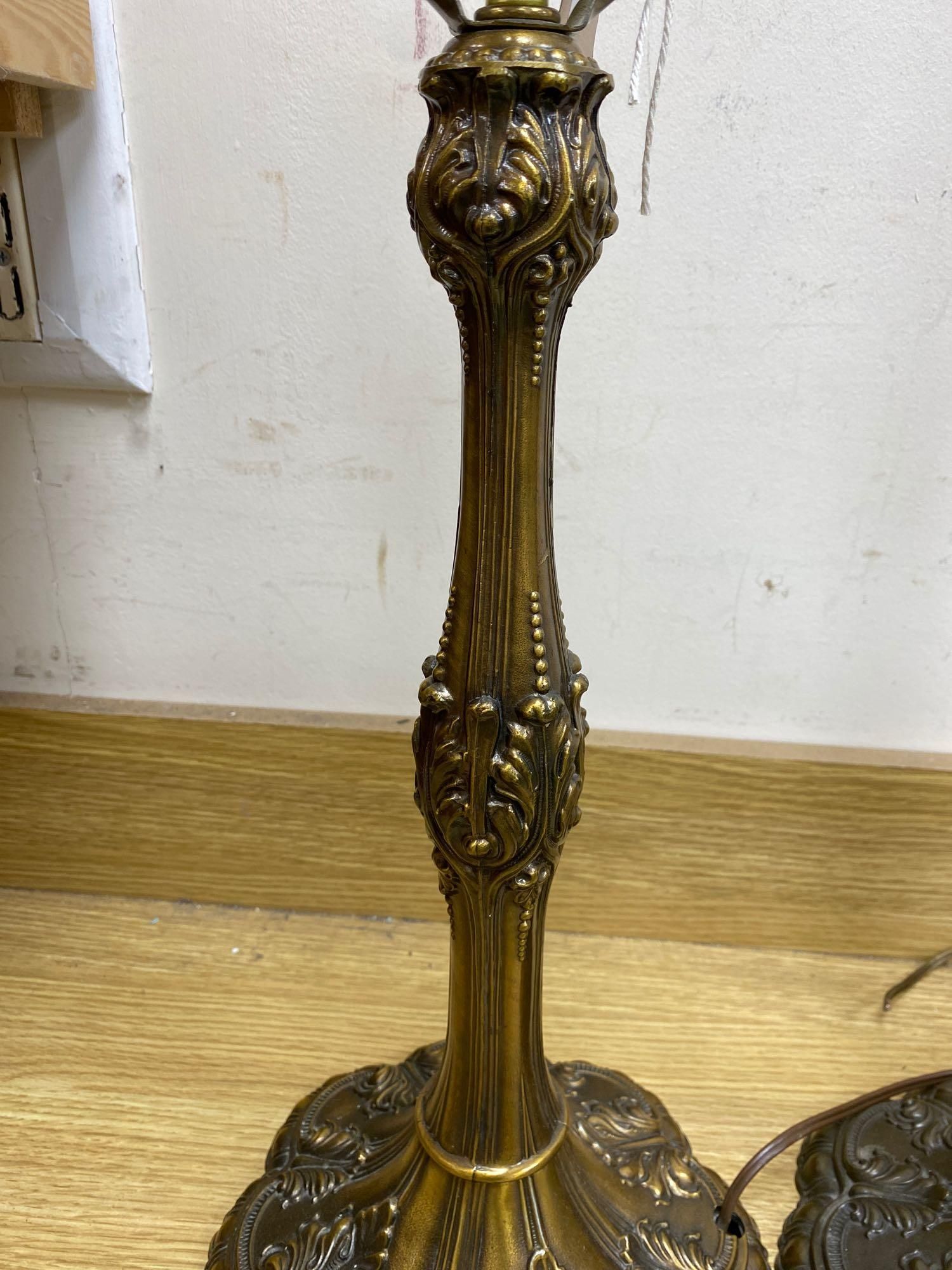 A pair of brass Art Nouveau style lamps